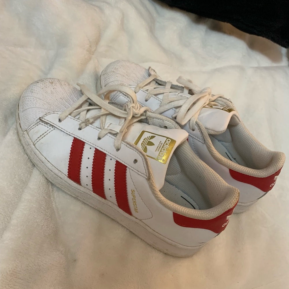 red and white adidas sneakers